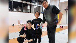 Jackson Wang & family at a fencing training center
