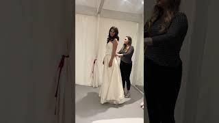 Trying on wedding dresses 