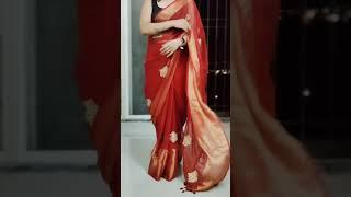 Red Sheer Georgette saree teamed up with sleeveless silk Black blouse