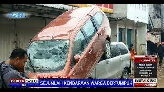 Bangkai Mobil dan Motor Bertumpuk Pascabanjir