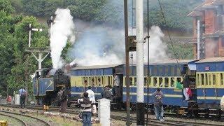 X-Class steam loco chugs away amidst a sea of railfans