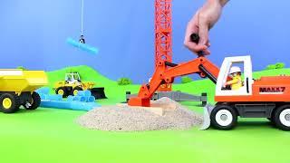 Excavators Digging in the Sand