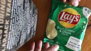 Opened Lay’s chips bag only 1 chip and a few crumbs.