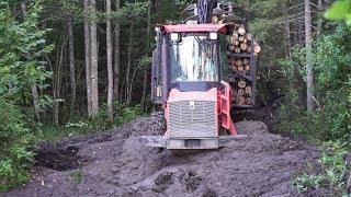 Logging with Valmet 840.3 difficult road mud skilled operator