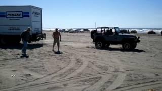 Dumb ass brings Penske truck to the beach