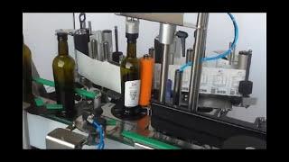 LA18 ‘EDIT’ AUTOMATIC VERSATILE LABELLERS - 2 Labels onto Tapered Bottle Liquid Solutions