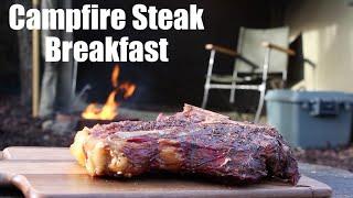 Porterhouse Steak Breakfast Cooked on the Campfire. Canvas Baker Tent.