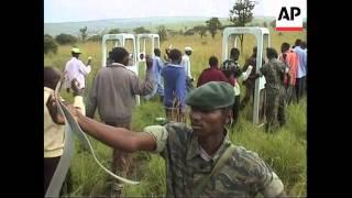 RWANDA RWANDA CUTS ARMY TO CUT COSTS