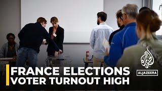 Voters turn out in numbers as ‘divided’ France casts ballots in key run-off