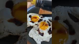 Epic sunny-side-up eggs with soy sauce and French baguette