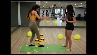 Girl popping balloon