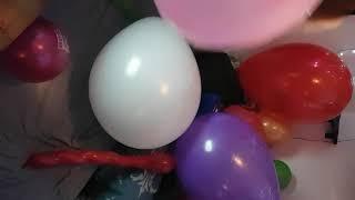 Girl Play and Pops Some Big Balloons