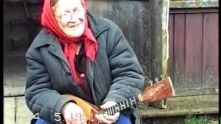 Old Woman Playing the Balalaika in Tver Region of Russia 1991