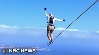 Watch Man crosses from Italian mainland to Sicily on a slackline