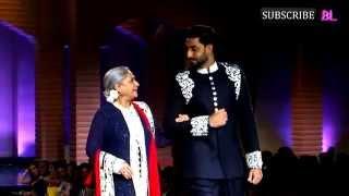 Jaya Bachchan and Abhishek Bachchan walk the ramp at the Mijwan fashion show