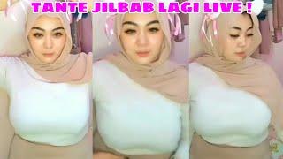 TANTE JILBAB CANTIK SUPER HOT DAN GEDE