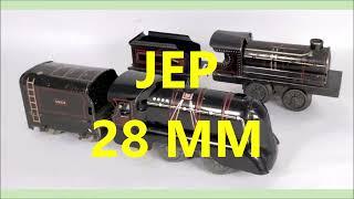 Small Tinplate 28 mm gauge clockwork trains by CR Rossignol JdeP JEP and Bing running on rails