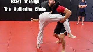 Blast Through The Guillotine Choke With A Double Leg Takedown