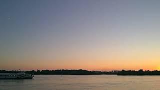 Boat is moving through the river wich called Irtysh in Omsk city in Russians Siberia