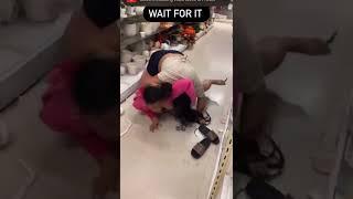 Two women fight over a man inside thrift store