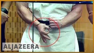  NZ mosque attacks suspect flashes white power sign in court  Al Jazeera English