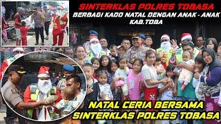 Kapolres dan Sinterklas Polres Tobasa Kunjungi Anak Anak & Beri Hadiah Kejutan Natal.