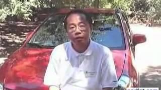 Koichi Suzuki President American Suzuki Motor Corporation talks to Lou Ann Hammond