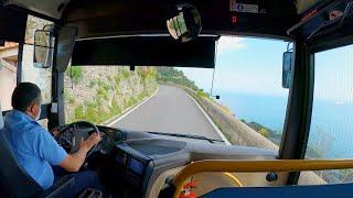Bus drive cliff coast Italy