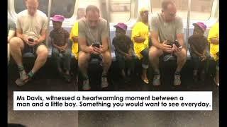 Heartwarming moment on the subway  between a man and a little boy