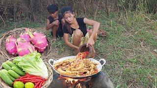 Pork intestine spicy cooking and Dragon fruit for food in forest Survival cooking