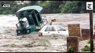 Himachal Pradesh Flash flood washes away vehicles in Mandi