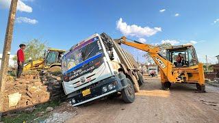 Stuck in Mud Ashok Leyland 12 Tyre Truck Pulling by Double JCB 3dx Backhoe