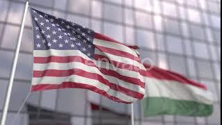 Flying Flags of the United States and Hungary in Front of a Skyscraper  Motion Graphics - Envat...