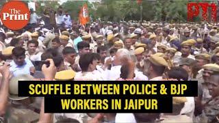 Watch Scuffle between police & BJP workers protesting against Gehlot govt in Rajasthans Jaipur