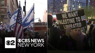 At least 1 in custody after protesters clash outside Columbia University