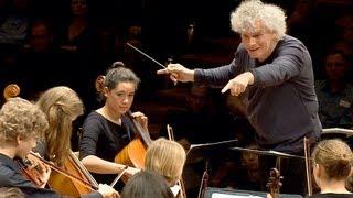 In rehearsal Simon Rattle conducts 6 Berlin school orchestras