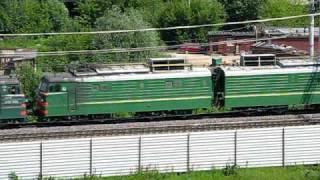 Electric locomotive VL10 pulling another VL10 and freight train.