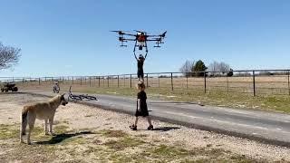 A dad uses a giant drone to lift his kid The end is so scary