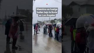 Mestros en huelga bailan bajo la lluvia en #losangeles #lausd #shortsunivision #univision34