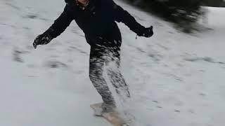 Snowboarding on a plank