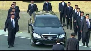 Kim Jong Un’s bodyguards trot beside his limousine when he travels