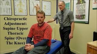 Chiropractic Adjustment Supine Upper Thoracic Spine Over the Knee