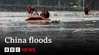 China floods Heavy flooding sees tens of thousands evacuated  BBC News