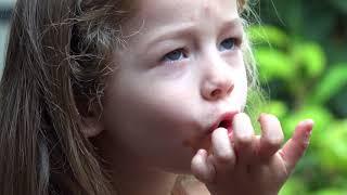 Toddler Girl Eating Popsicle