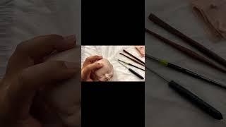 Sculpting a baby face in polymer clay