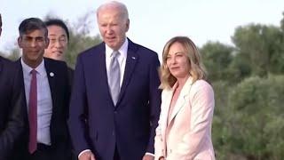 Joe Biden appears to wander away and in need of direction during G7