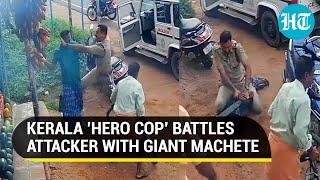 Kerala cop fights man holding a giant machete Video goes viral netizens applaud hero