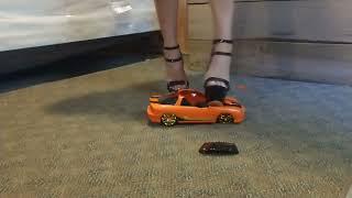 crush toy cars with stiletto heels