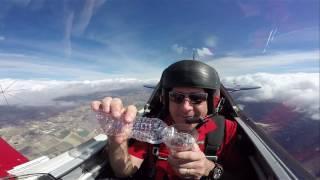 Airplane Drink Trick-Pouring a Beverage While Rolling the Plane