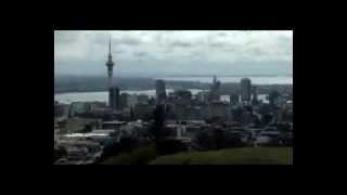 Auckland city views from Mount Eden Lookout on a cloudy day.